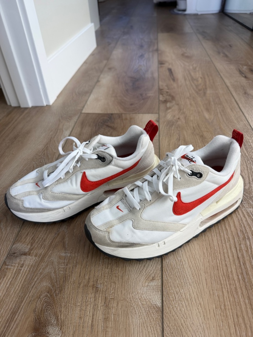 Nike women’s Dawn White and Red Low-Top Swoosh Sneakers